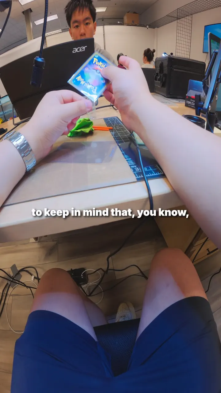 A Will it 10? video: a Gengar VMAX card held up at the grading desk